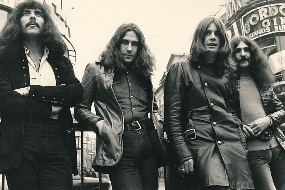 A black and white image of the four members of Black Sabbath.