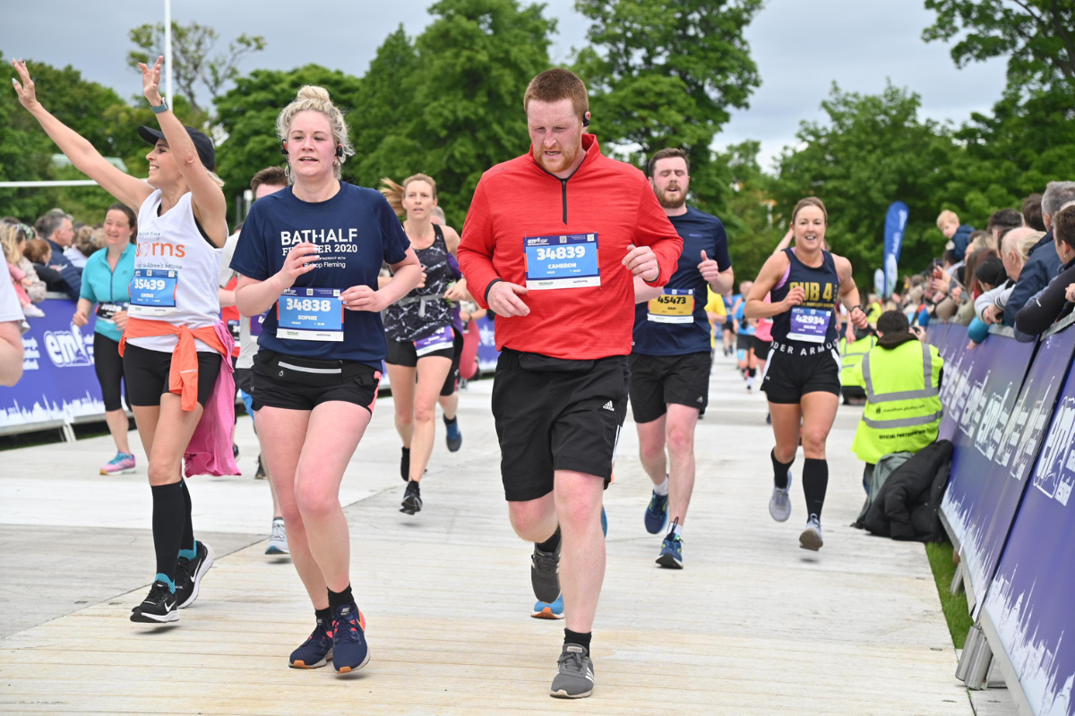 Edinburgh Marathon A group of people running at the Edinburgh Running Festival.