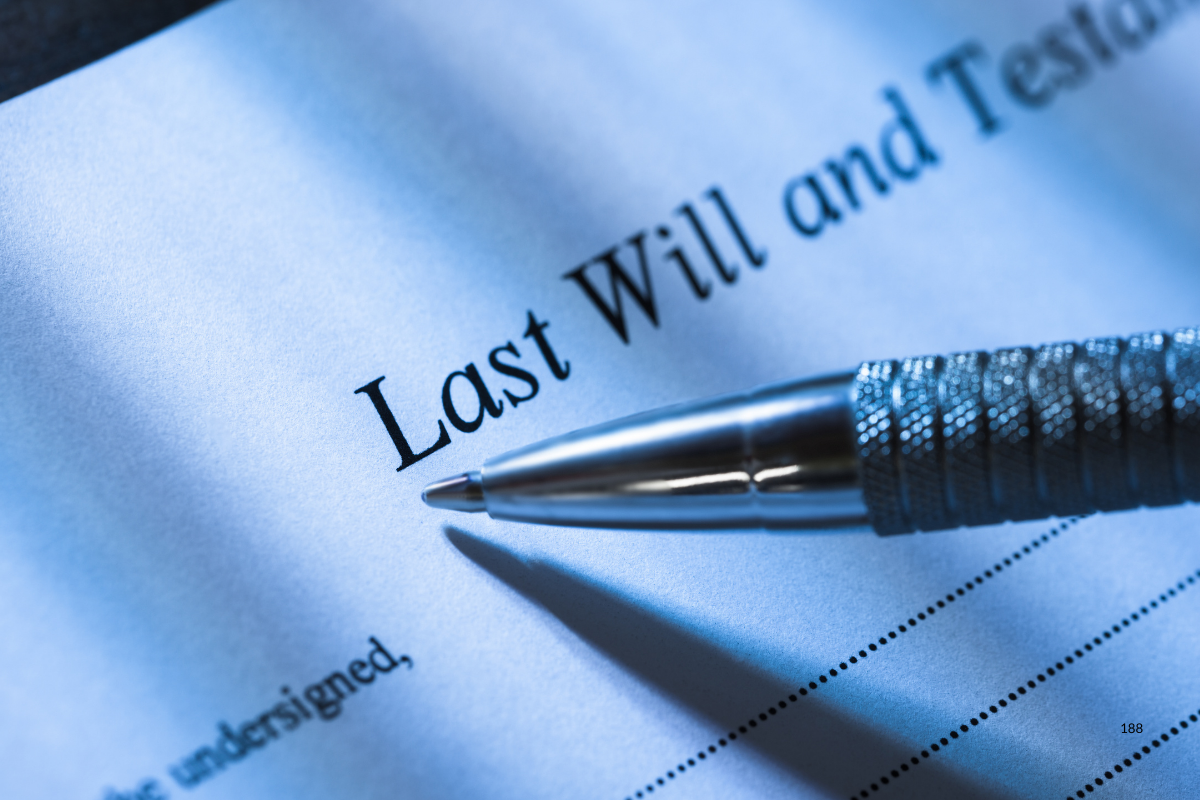 a pen about to sign a last Will and Testament