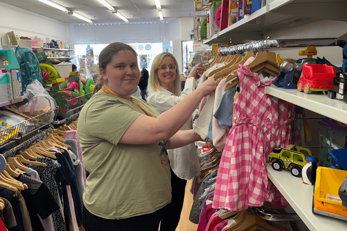 Acorns retail volunteers working together in one of the charity's shops.
