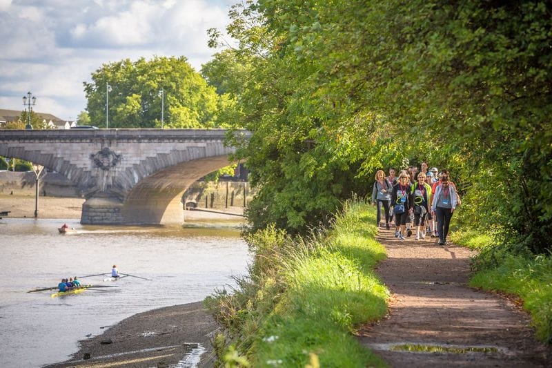 TPC UC Thames Walkers on a path alongside the River Thames