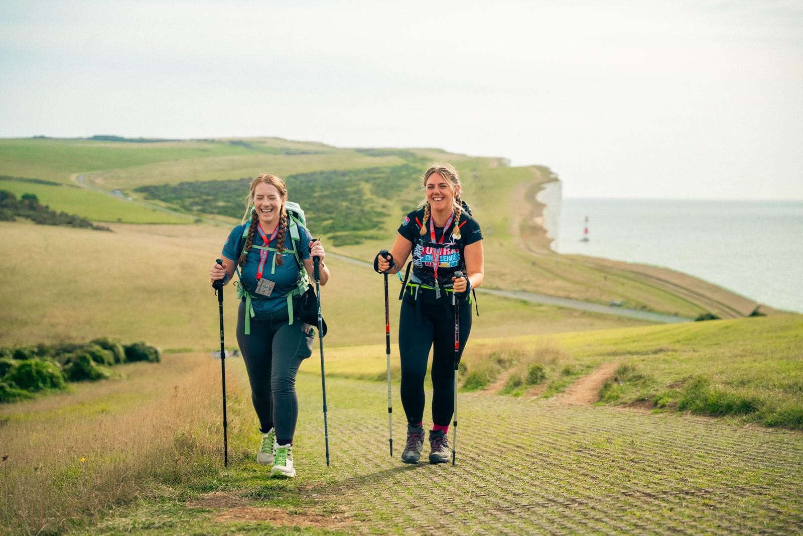 Walkers on the cliffs of the South Downs Way, taking part in the South Coast Ultra Challenge